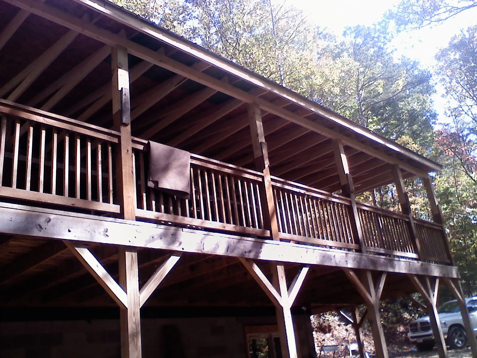 Timber framing under a new elevated porch and deck — Roof Leak Repair in Pond Creek by Roofing Brothers